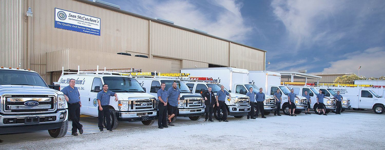 Sean McCutcheon's Air Conditioning and Heating, Inc.compnay and trucks